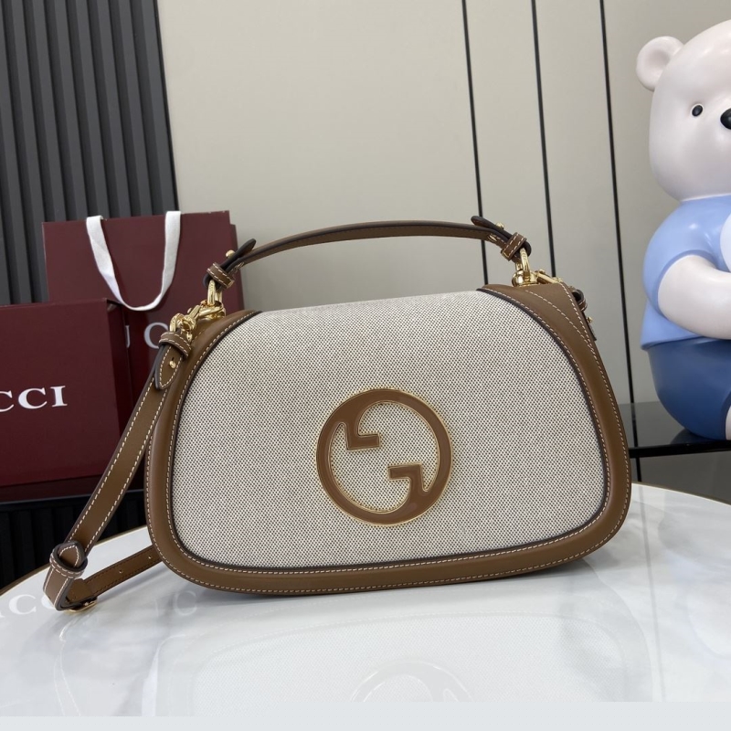 G*u*i top handle bags